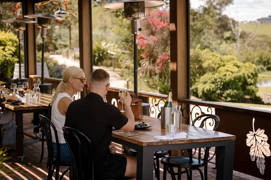 Fondata 1872 wedding venue Kangaroo Ground Couple enjoying a drink and antipasto on the outdoor terrace at Fondata 1872 wedding venue, Kangaroo Ground
